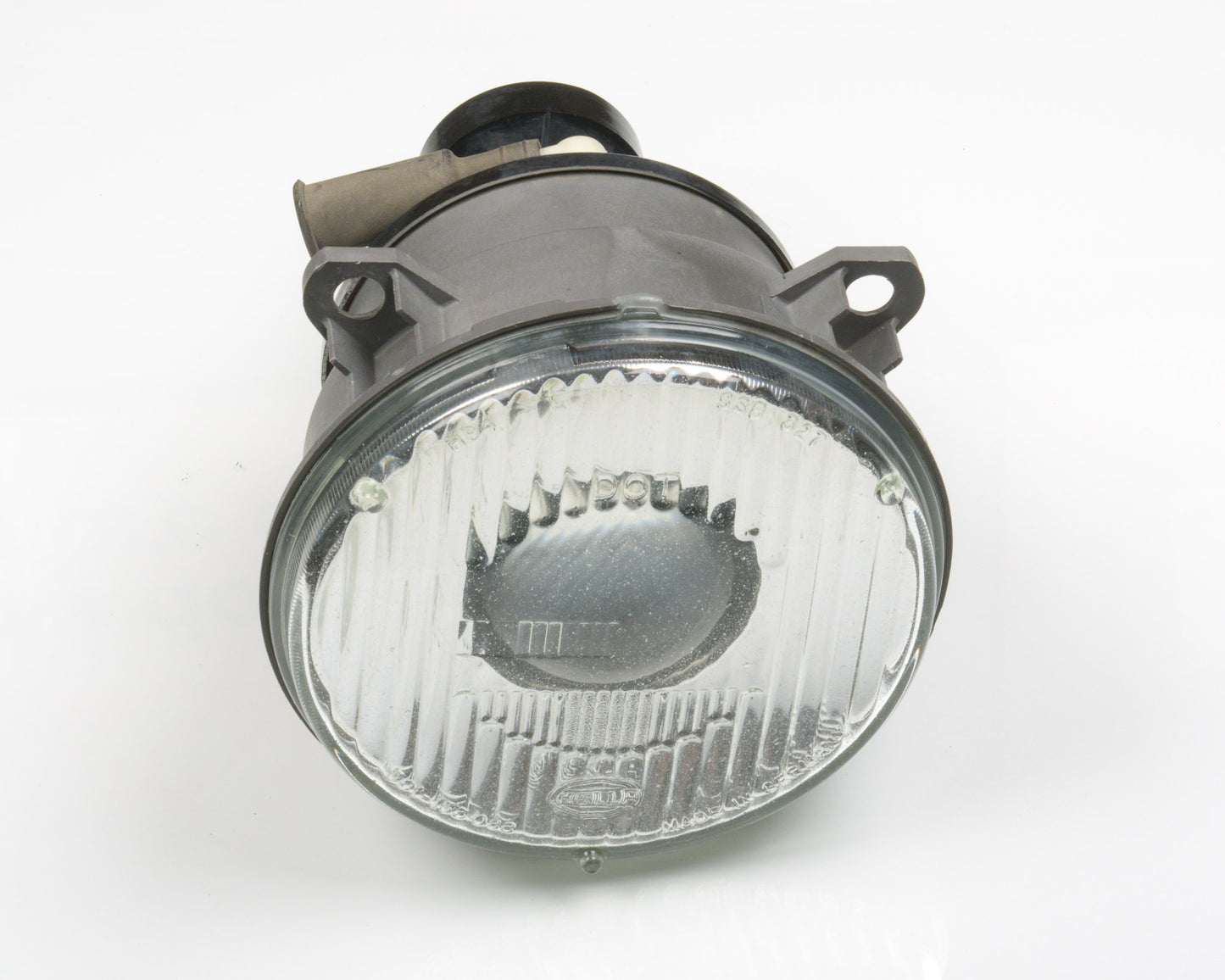 Car headlight on a white background