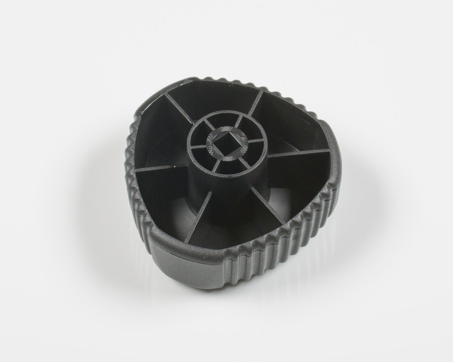 Black plastic gear on a white background
