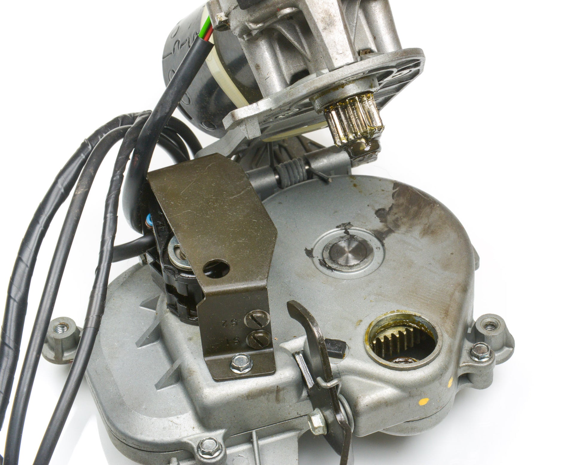 Close-up of a mechanical engine component on a white background