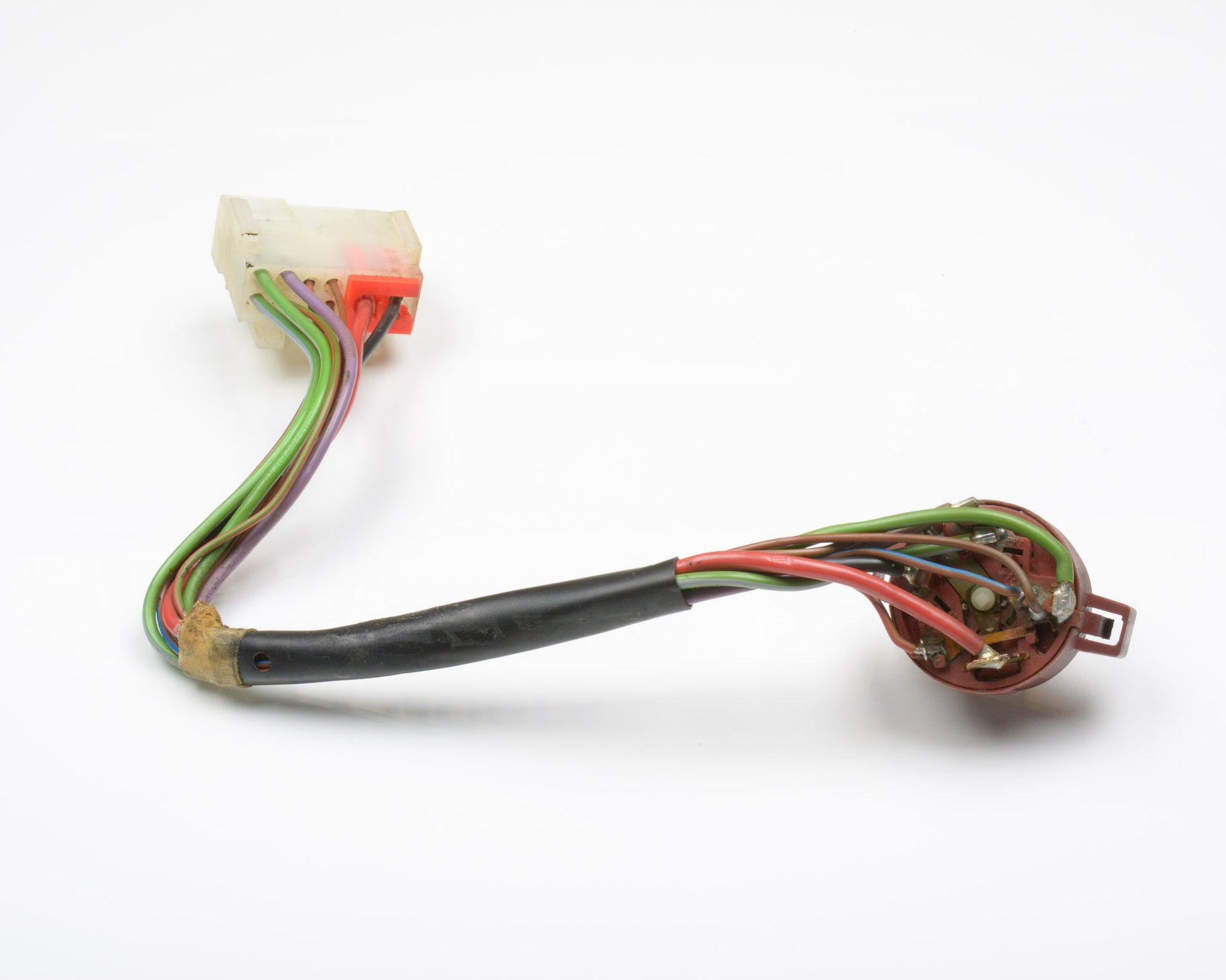 Electrical wiring harness with connectors on a white background
