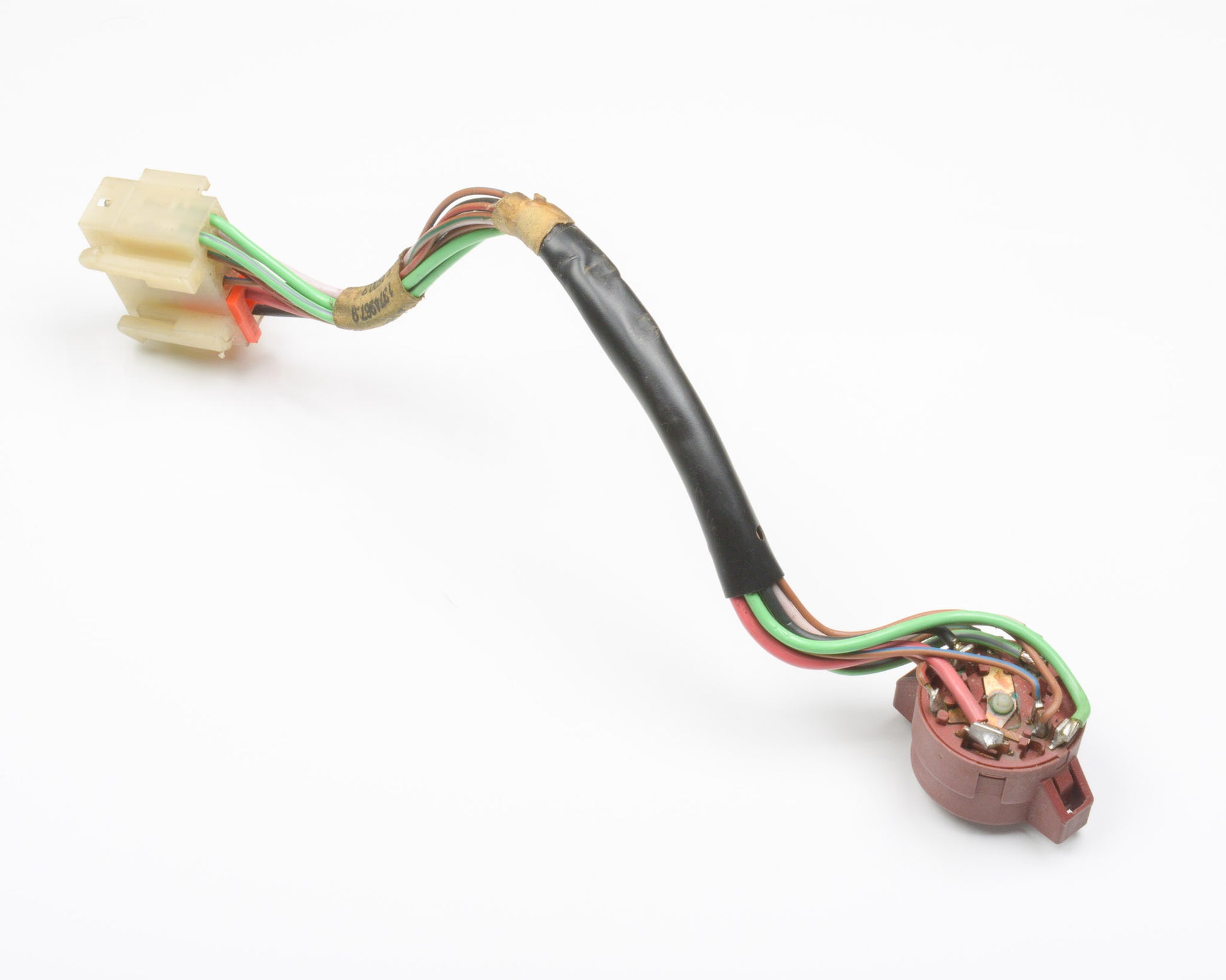 Electrical wiring harness with connectors on a white background